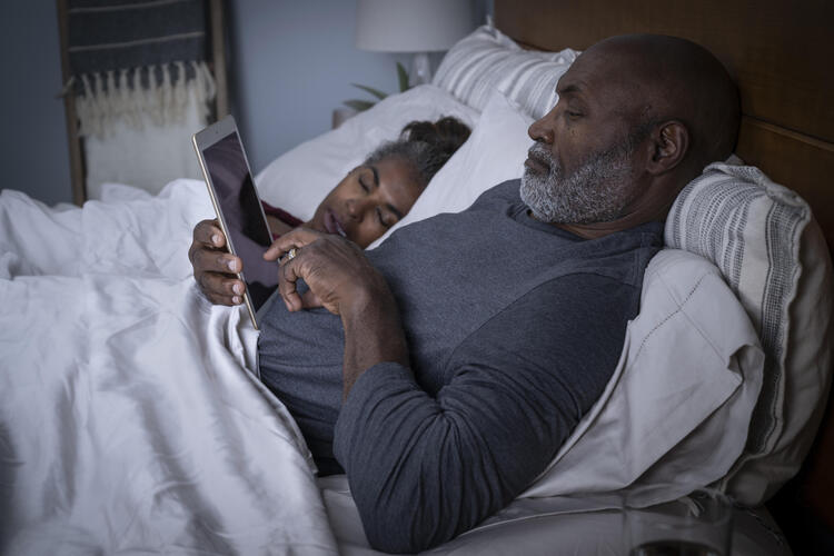  Laying in bed on a soft pillow