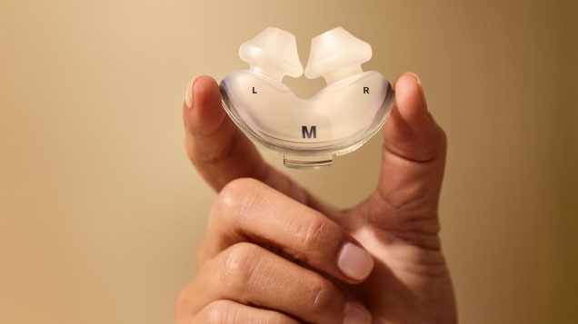 Hand holding Resmed AirFit P10 cushion