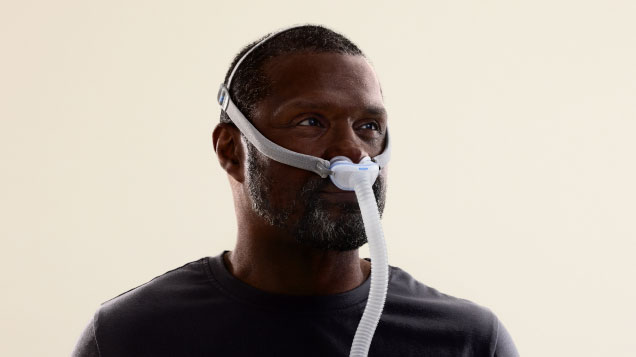 Man wearing Resmed AirFit P10 mask
