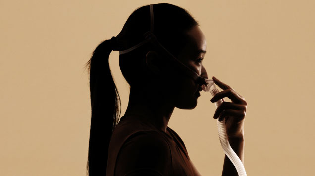 Silhouette of woman wearing Resmed AirFit P10 mask